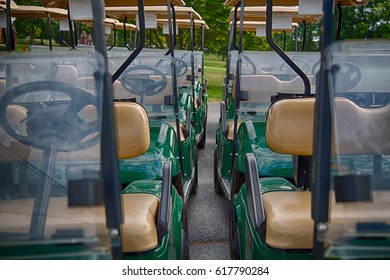 Detail Of Golf Carts Lined Up In A Row.