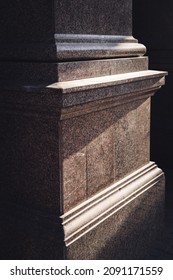 Detail of a granite figured column with contrasting shadows