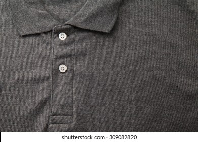 Detail Of A Gray Polo Shirt.