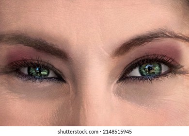 detail of green eyes of beautiful latina woman mexican