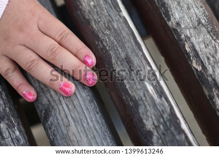 Similar – a woman and a child show their nail polish