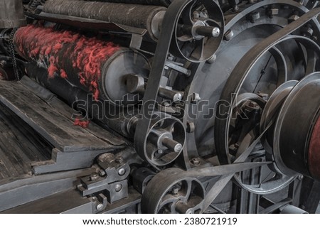 Detail of a historic machine in a textile mill.