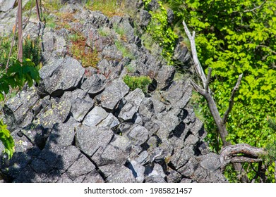 Detail of horizontal basalt columns at the summit of mount Jehla in the Czech Republic - Shutterstock ID 1985821457
