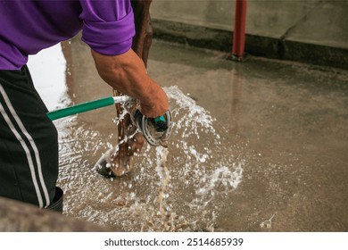 Detail of horse owner hands cleaning horse hoof with a hoof picker scraping off dust. - Powered by Shutterstock