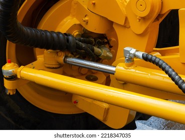 Detail Of Hydraulic Bulldozer Piston Excavator Arm. Closeup Of A Hydraulic Equipment.