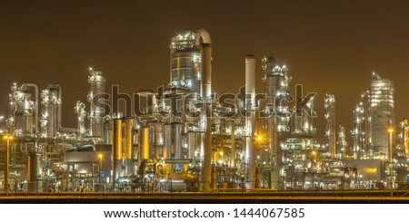 Detail of illuminated petrochemical industry in darkness on Maasvlakte area port of Rotterdam, the Netherlands