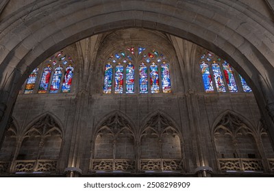 Detail of interior architecture and stained glass windows in the Gothic cathedral of Oviedo, Spain - Powered by Shutterstock