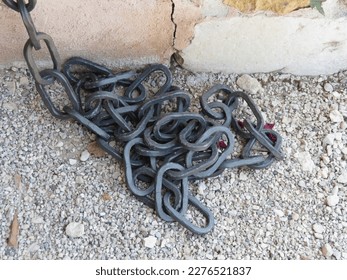 detail of an iron chain useful as slavery or prison concept - Shutterstock ID 2276521837