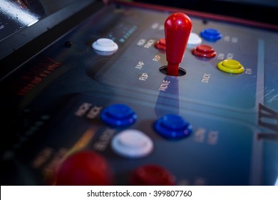  Detail Of A Joystick And Buttons On An Old Arcade Game In A Gaming Room