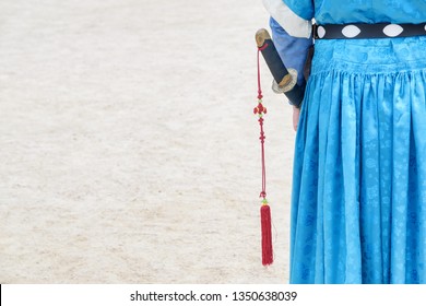 Detail Of Korean Traditional Military Clothing. Back View Of Royal Guard Wearing Blue Jeonbok At Courtyard Of Gyeongbokgung Palace In Seoul, South Korea.