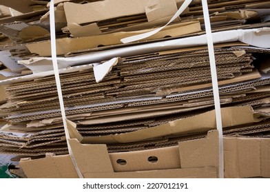 Detail Laced Package Made Of Recyclable Brown Cardboard Ready For Transport To The Paper Mill