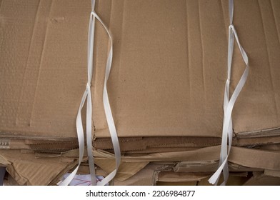 Detail Laced Packages Made Of Recyclable Brown Cardboard Ready For Transport To The Paper Mill