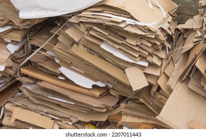 Detail Laced Packages Made Of Recyclable Brown Cardboard Ready For Transport To The Paper Mill