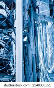 Detail Of Large Number Of Ethernet Cables Tied Together Connecting Racks Inside Server Room