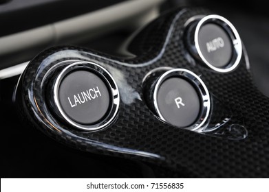detail of launch control button fitted to a powerful motor car