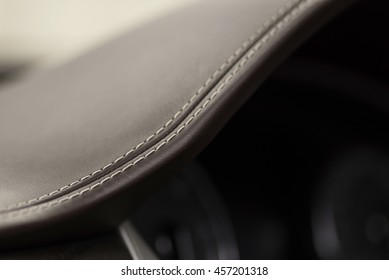 Detail Of Leather Car Dashboard With Stich.