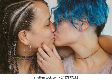 Detail Of A Lesbian Kiss Between Same Gender Teen Couple.