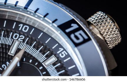 Detail Of A Luxury Watch On Black Background. Selective Focus, Shallow Depth Of Field.