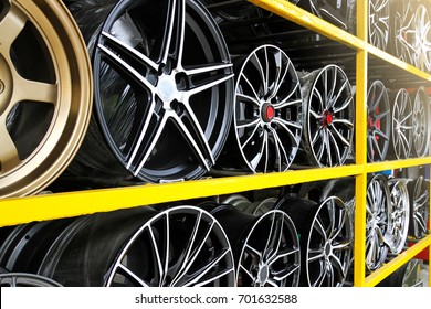 Detail of Magnesium alloy wheel or max wheels of car on shelf in a shop.