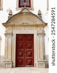 Detail of the main portal of the Church of Our Lady of the Cape, built in 1707 in Cape Espichel, Sesimbra, Portugal.