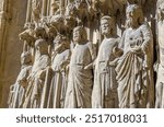 Detail of the main portal of the Gothic cathedral of Huesca, Spain. It features a large arch decorated with figures of martyrs, virgins, angels and prophets. It was built between 1302 and 1307