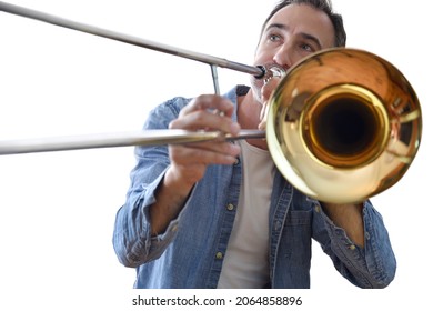 Detail of man playing trombone with white isolated background. Front view. Horizontal composition.