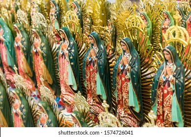 Detail of many craftmanship of the Virgin of Guadalupe on a shelf