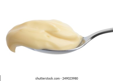 Detail Of Mayonnaise On Stainless Steel Spoon. Isolated.