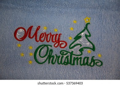 Detail Merry Christmas Text Design  Embroidery On White Towel For A Gift Use