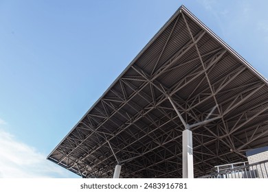 Detail of the metal roof structure of the stadium against the sky - Powered by Shutterstock