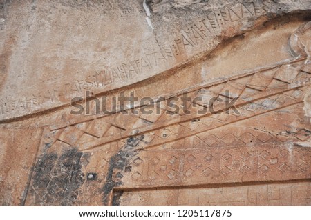 The Detail of Midas Monument is located Yazılıkaya (lit. 'inscribed rock'), Phrygian Yazılıkaya, or Midas Kenti (Midas city) which is Phrygian archaeological remains and inscription mentioning Midas.