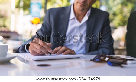 detail middle age businessman portrait writing stock photo edit now detail of middle age businessman portrait writing an essay outdoors in rome italy