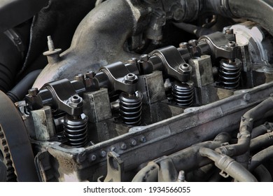 Detail Of Modern Diesel Engine Repair, Closeup Of Injectors In Cylinder Head With Camshaft And Rocker Arms