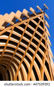 Detail Of A Modern Wooden Architecture In Glued Laminated Timber On A Blue Sky