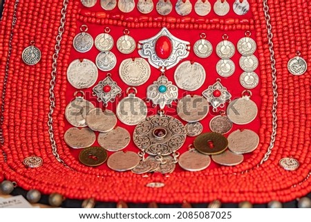 Detail of the national costume of the Turkic peoples of Russia sheathed with precious coins and beads - monisto neckalce