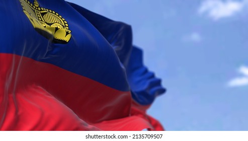 Detail Of The National Flag Of Liechtenstein Waving In The Wind On A Clear Day. Liechtenstein Is A Constitutional Monarchy Headed By The Prince Of Liechtenstein. Selective Focus.