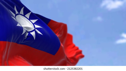 Detail of the national flag of Taiwan - Republic of China waving in the wind on a clear day. Democracy and politics. Patriotism. East asian country. Selective focus. - Powered by Shutterstock