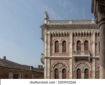 Detail of the neoromantic Palazzo delle Debite, Padova, Italy. on the right a glimpse of a column of the Palazzo della Ragione
