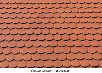detail of new ceramic shingle roof tile background pattern
