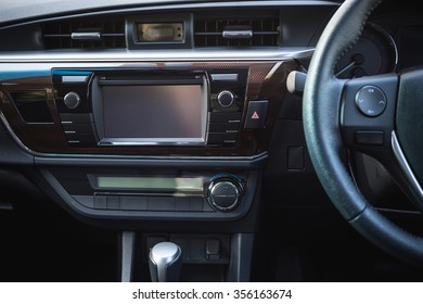 Detail Of New Modern Car Interior, Focus On Stereo Screen