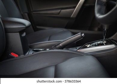 Detail Of New Modern Car Interior, Focus On Hand Break