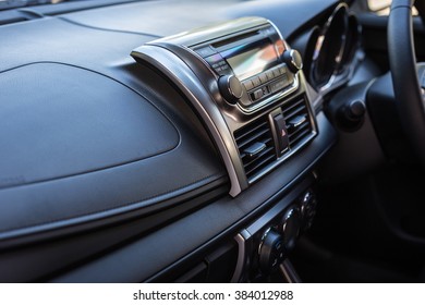 Detail of new modern car interior, Focus on stereo - Powered by Shutterstock