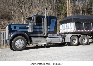 Detail Od A Semi Truck With Tarp Covering Load