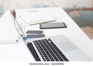 Detail Of The Office Desk With Laptop And Mobile Phone