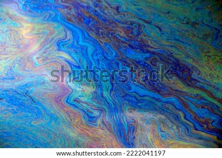 Detail of an oil spillage in open water 