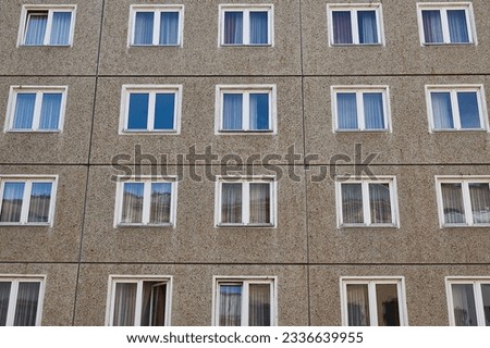 Detail of an old apartment building, eastern european panel block of flats, cheap apartments