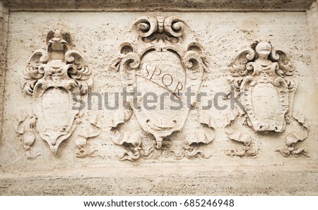 Detail of old basrelief in Roma, Italy