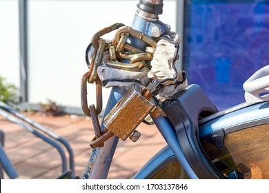 Detail Of Old Bike With Rusty Chain Lock.              