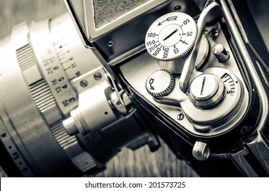 Detail of old classic camera mechanical dials in vintage monochrome style