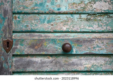 detail of old green wooden door